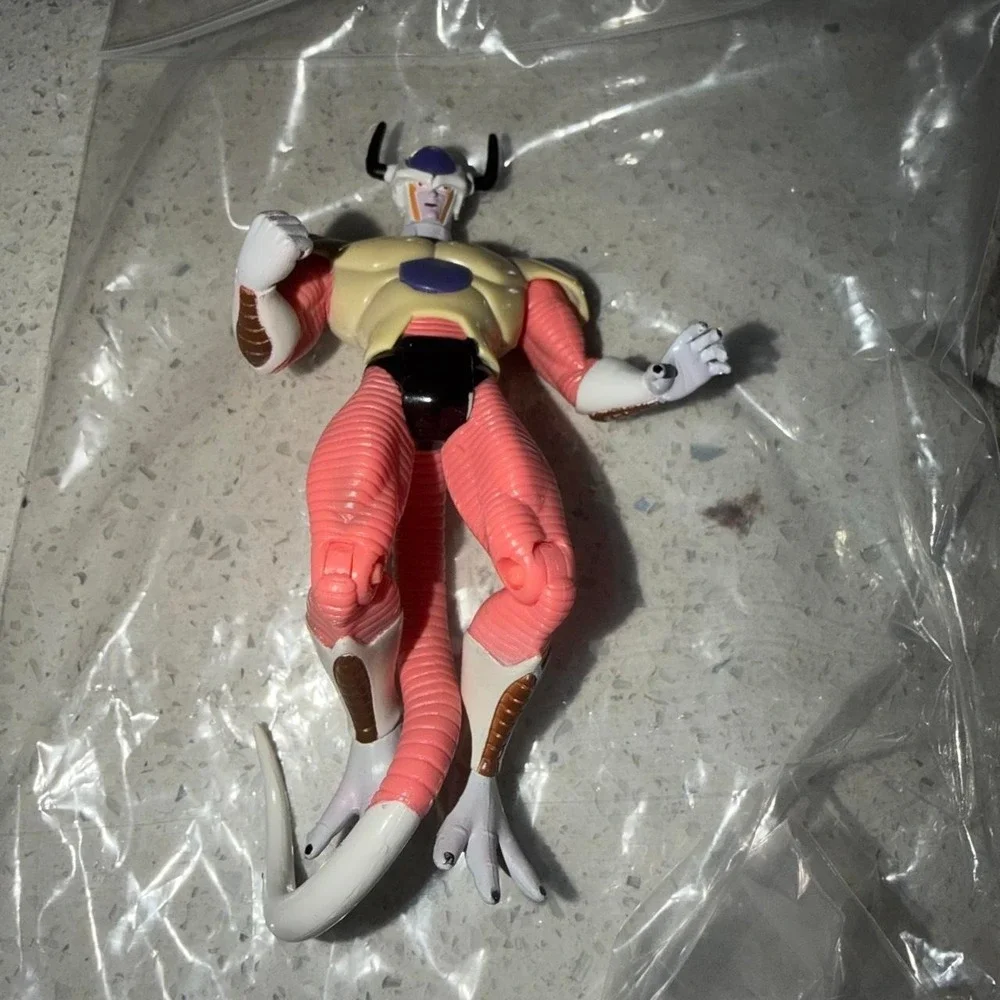 Dragon Ball Z Frieza action figure with pink, beige, and white color scheme